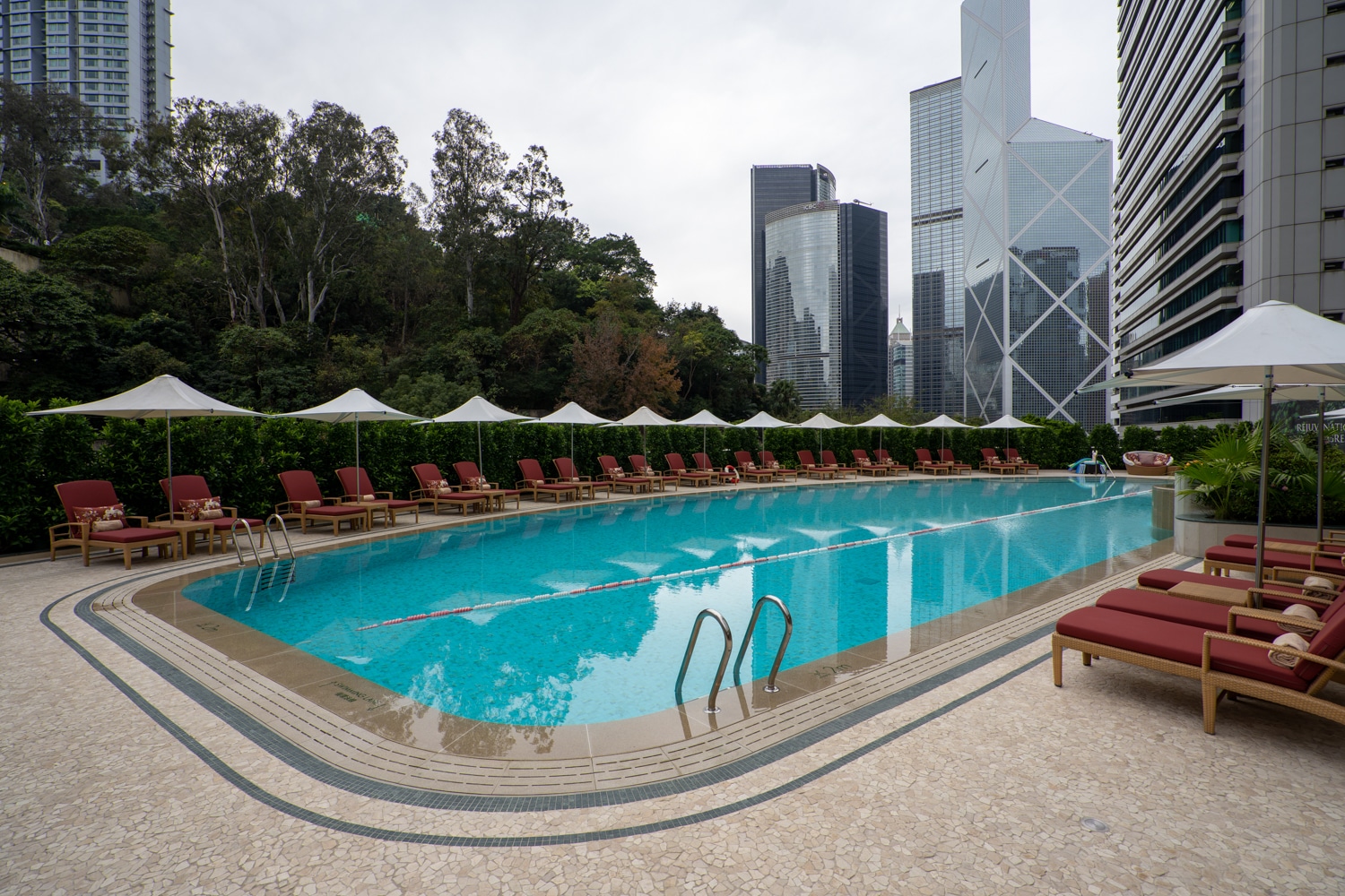 Island Shangri-La Hong Kong pool with Victoria Harbour skyline