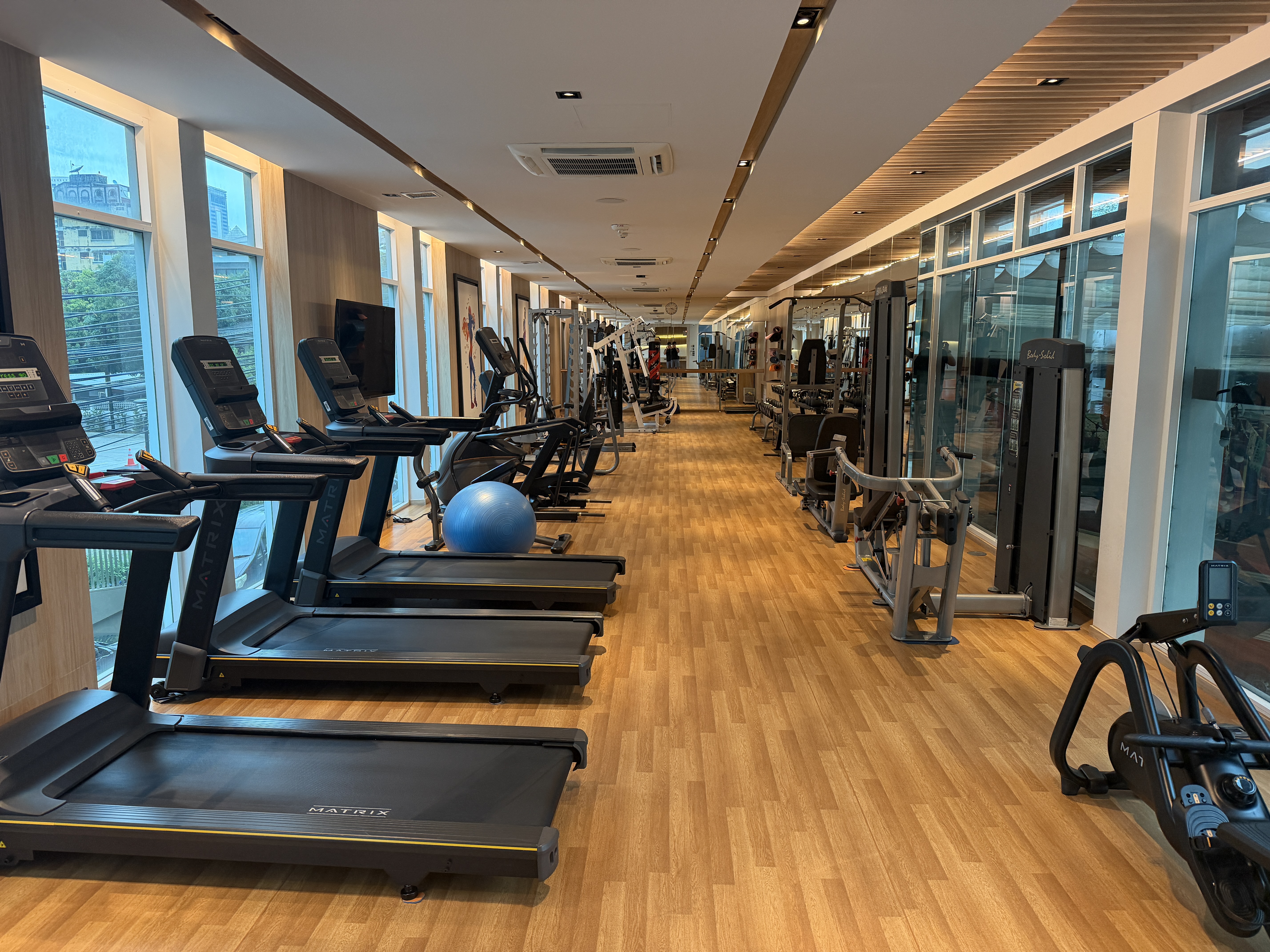 Fitness centre with treadmills at Novotel Living Bangkok Sukhumvit Legacy