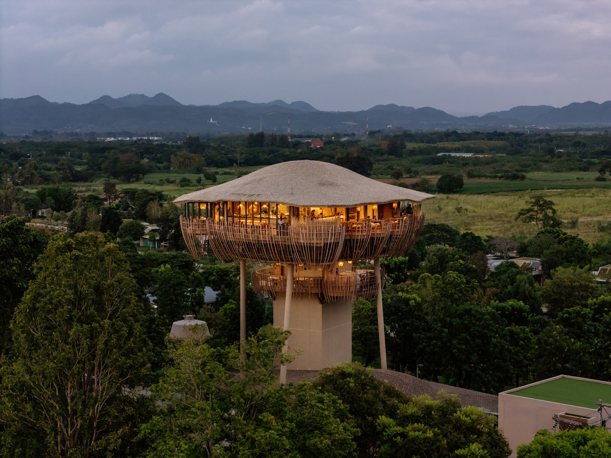 dusitD2 Khao Yai elevated bamboo restaurant at dusk