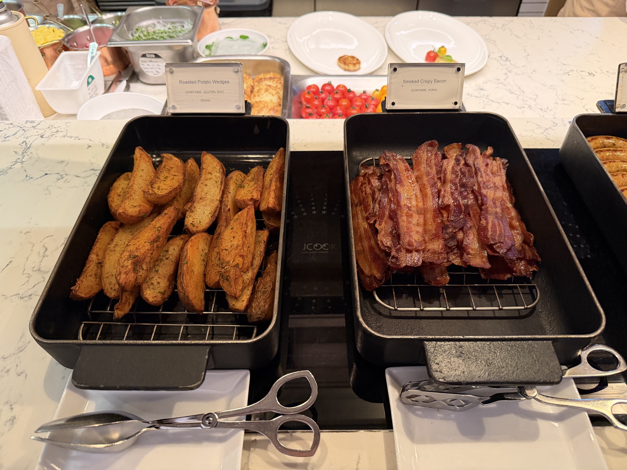 Bacon and potato wedges at the Riva del Fiume hot line at Four Seasons Hotel Bangkok at Chao Phraya River
