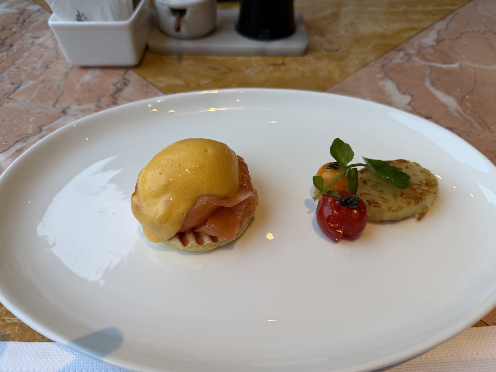 Made-to-order eggs benedict with salmon at Riva del Fiume at Four Seasons Hotel Bangkok at Chao Phraya River