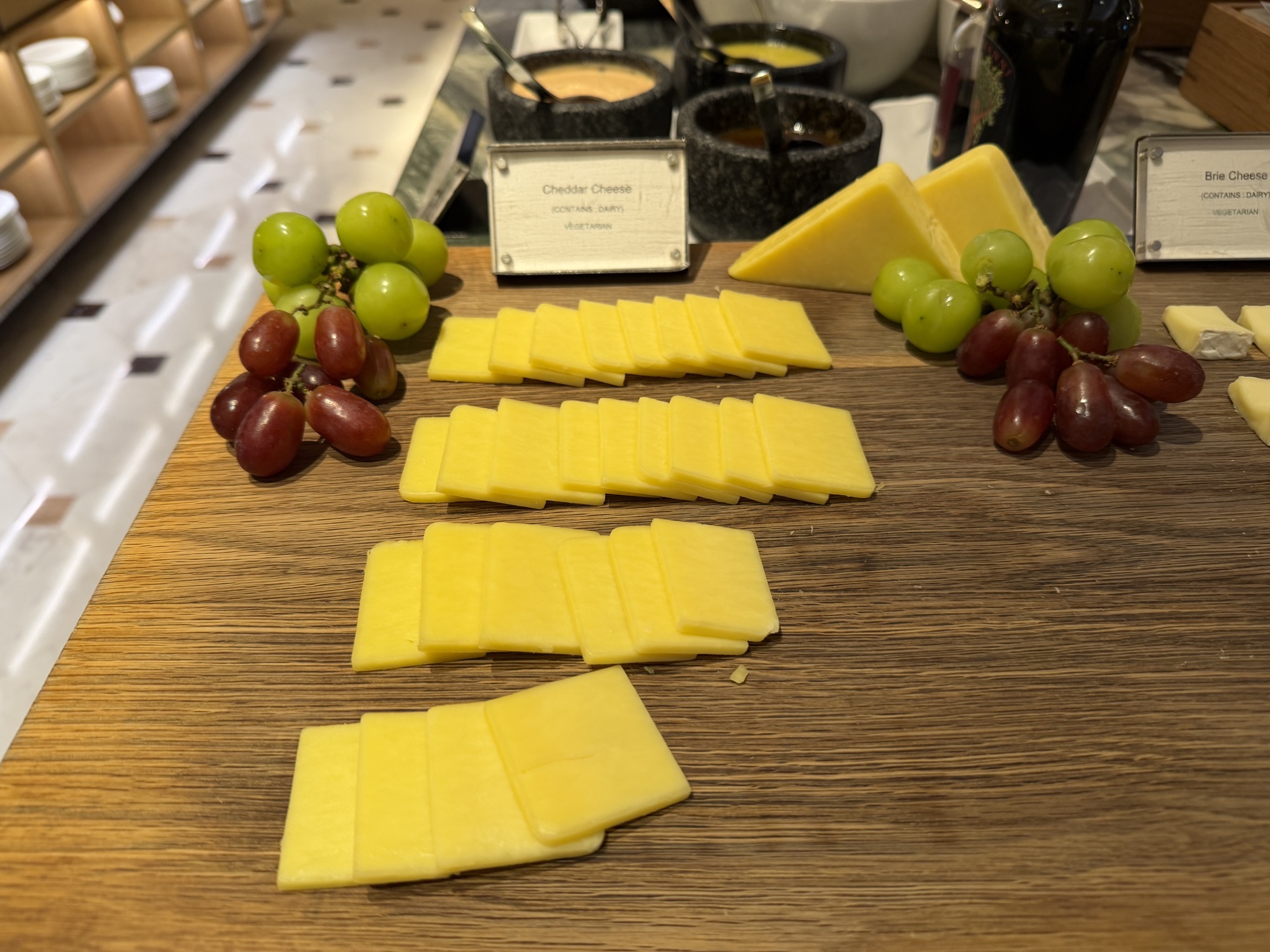 Cheddar cheese board with grapes at the Riva del Fiume breakfast at Four Seasons Hotel Bangkok at Chao Phraya River