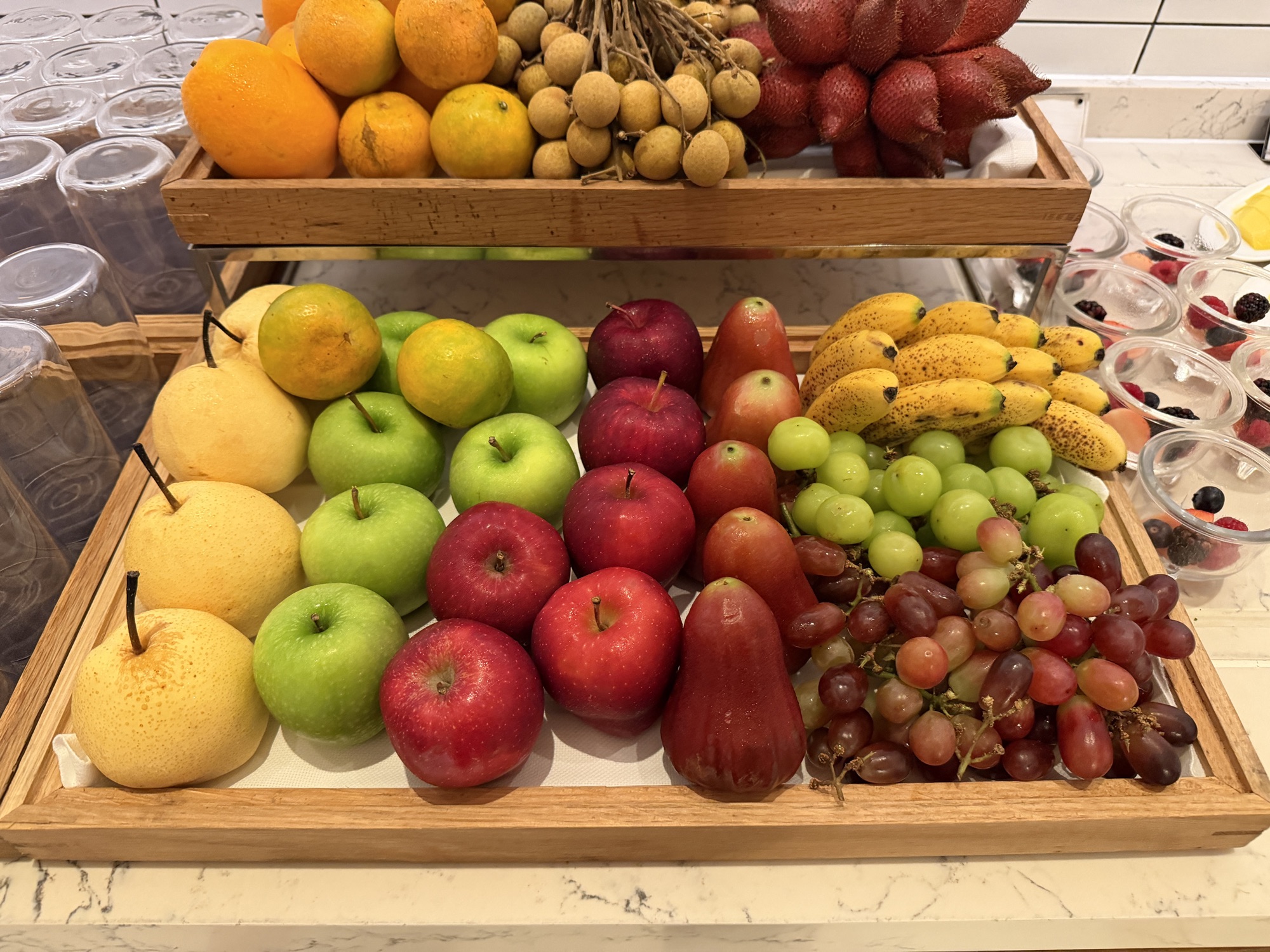 Whole fruit baskets at the Riva del Fiume breakfast at Four Seasons Hotel Bangkok at Chao Phraya River