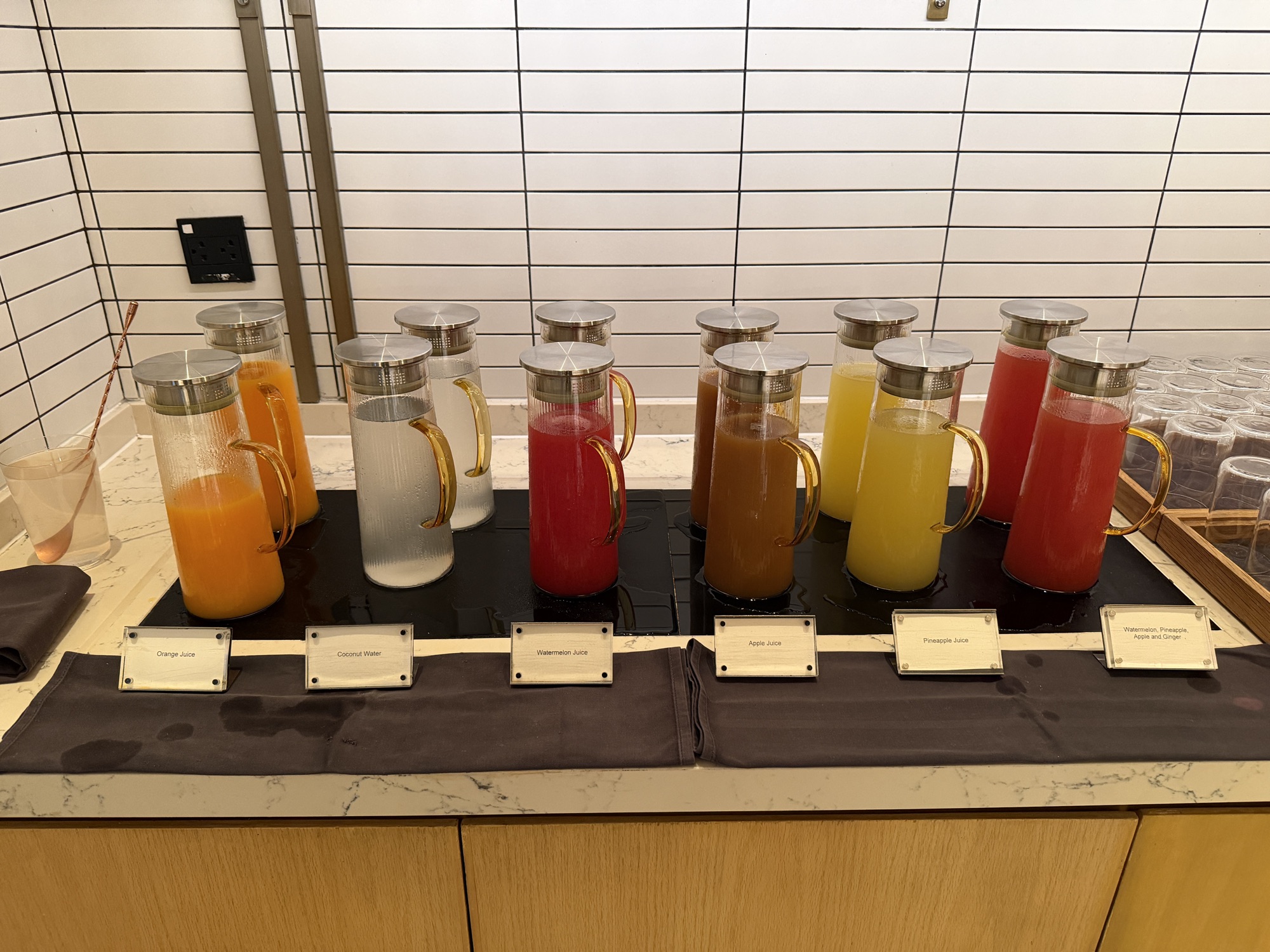 Fresh juice jars at the Riva del Fiume breakfast at Four Seasons Hotel Bangkok at Chao Phraya River