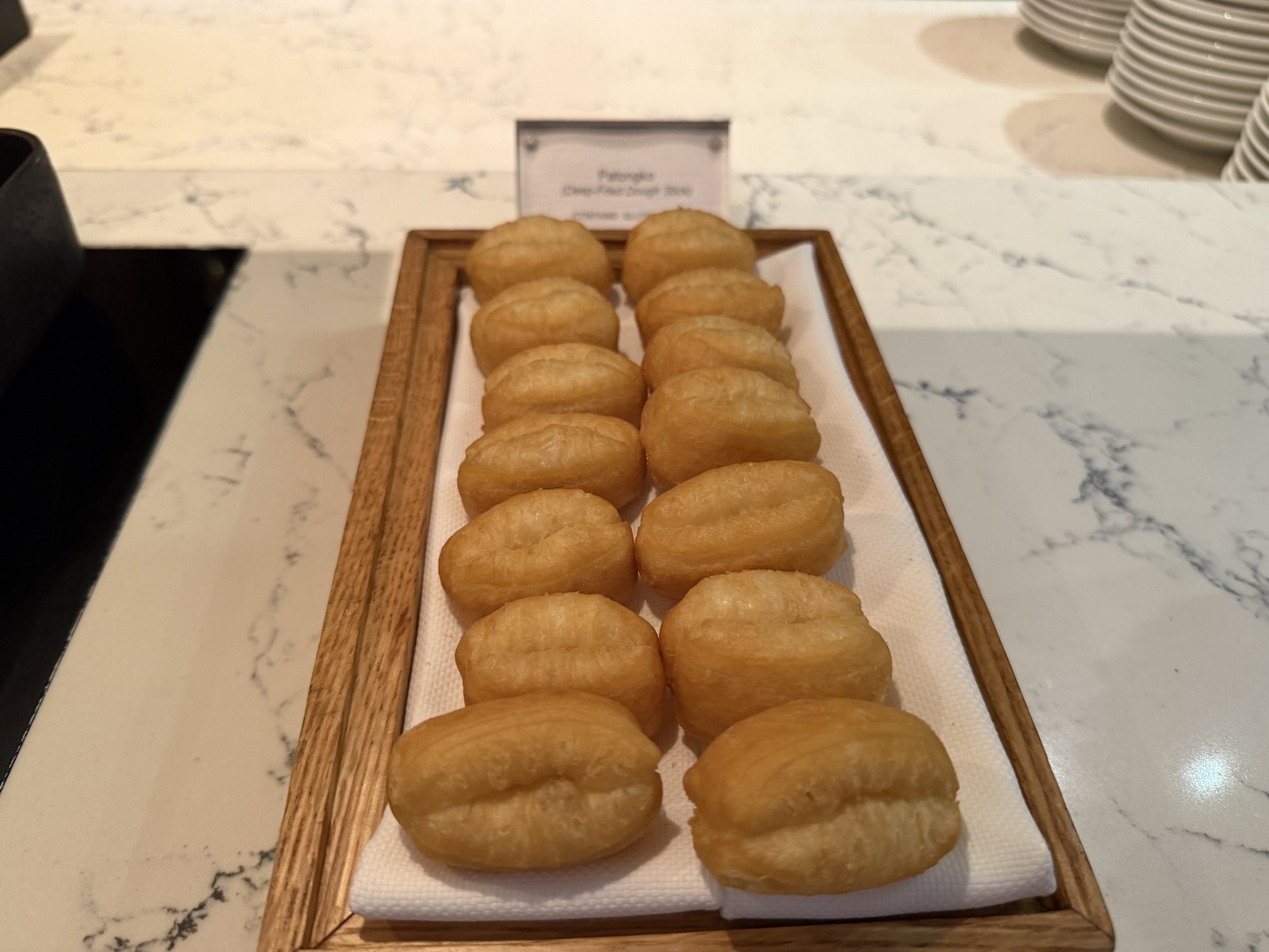 Patongko deep-fried dough sticks at the Riva del Fiume breakfast at Four Seasons Hotel Bangkok at Chao Phraya River