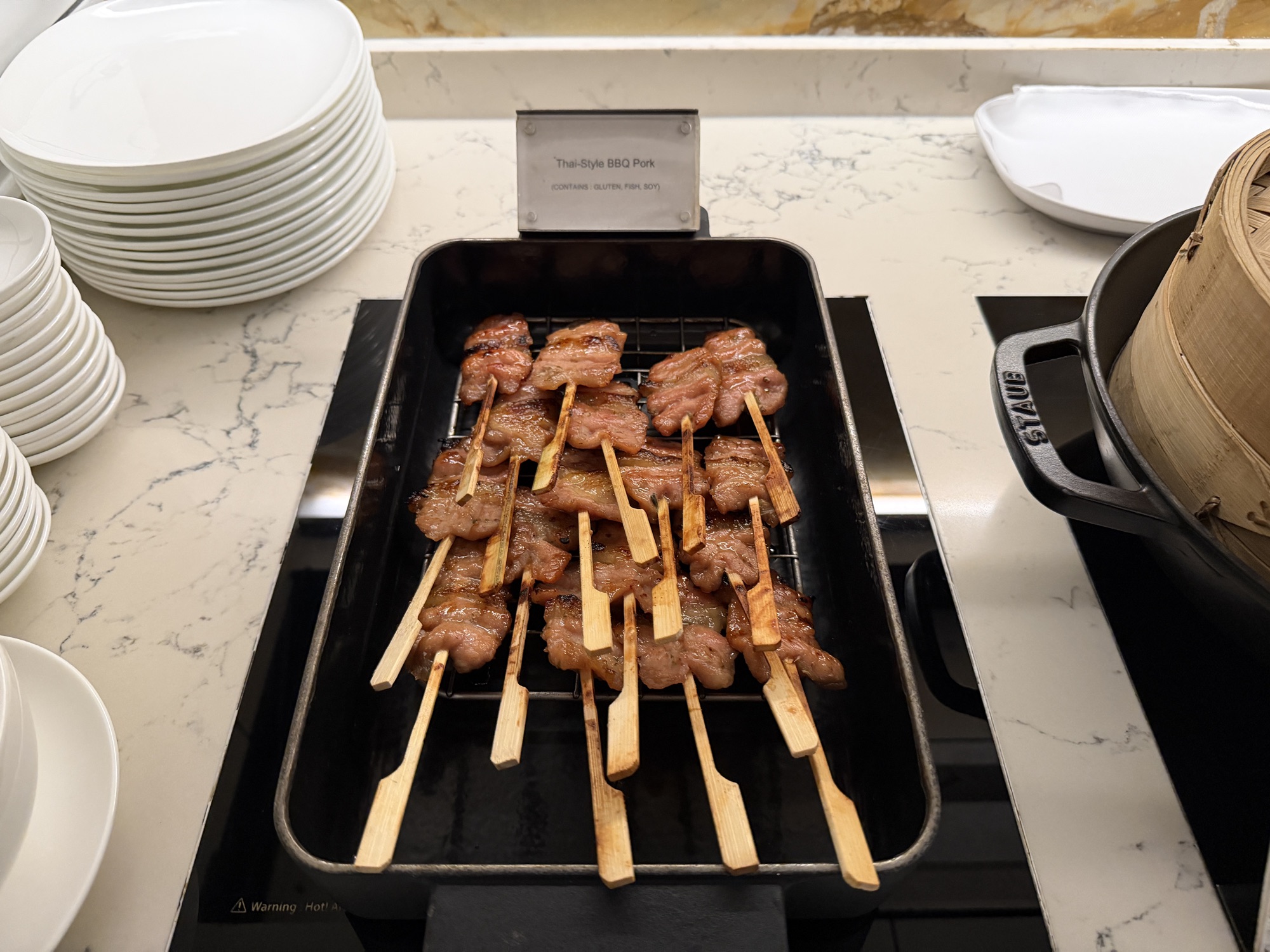 Thai-style barbecue pork skewers at the Riva del Fiume breakfast at Four Seasons Hotel Bangkok at Chao Phraya River