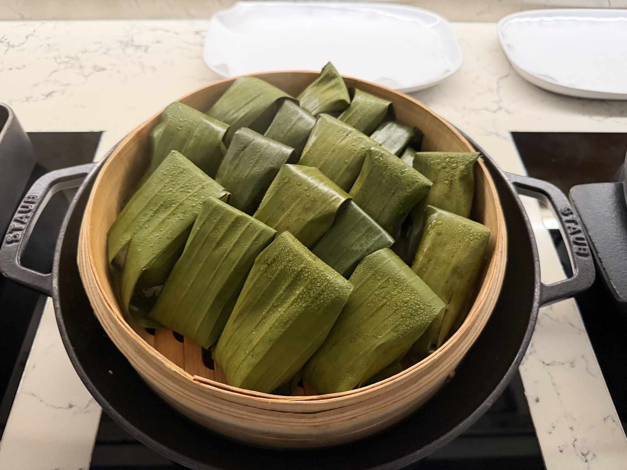 Sticky rice parcels in pandan leaves at the Riva del Fiume breakfast at Four Seasons Hotel Bangkok at Chao Phraya River