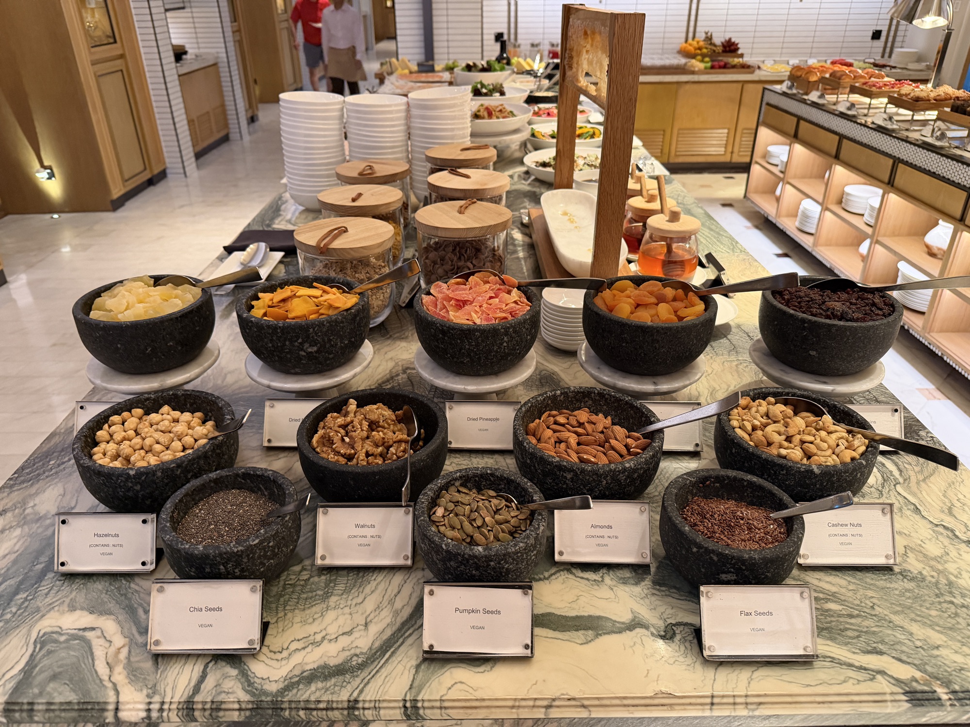 Granola and toppings station at the Riva del Fiume breakfast at Four Seasons Hotel Bangkok at Chao Phraya River