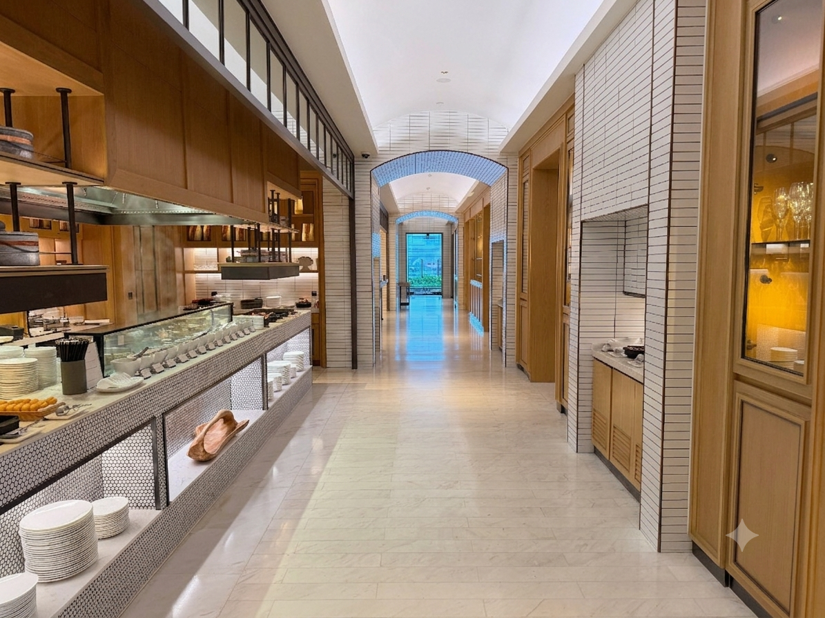 The buffet runs the length of a long marble hall. at Four Seasons Hotel Bangkok at Chao Phraya River