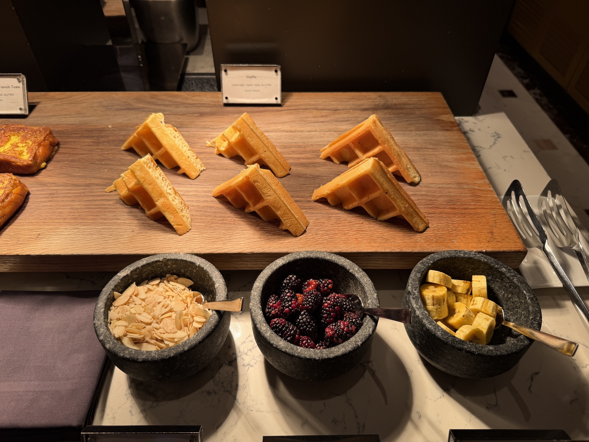 Waffles with berries and almonds at the Riva del Fiume breakfast at Four Seasons Hotel Bangkok at Chao Phraya River