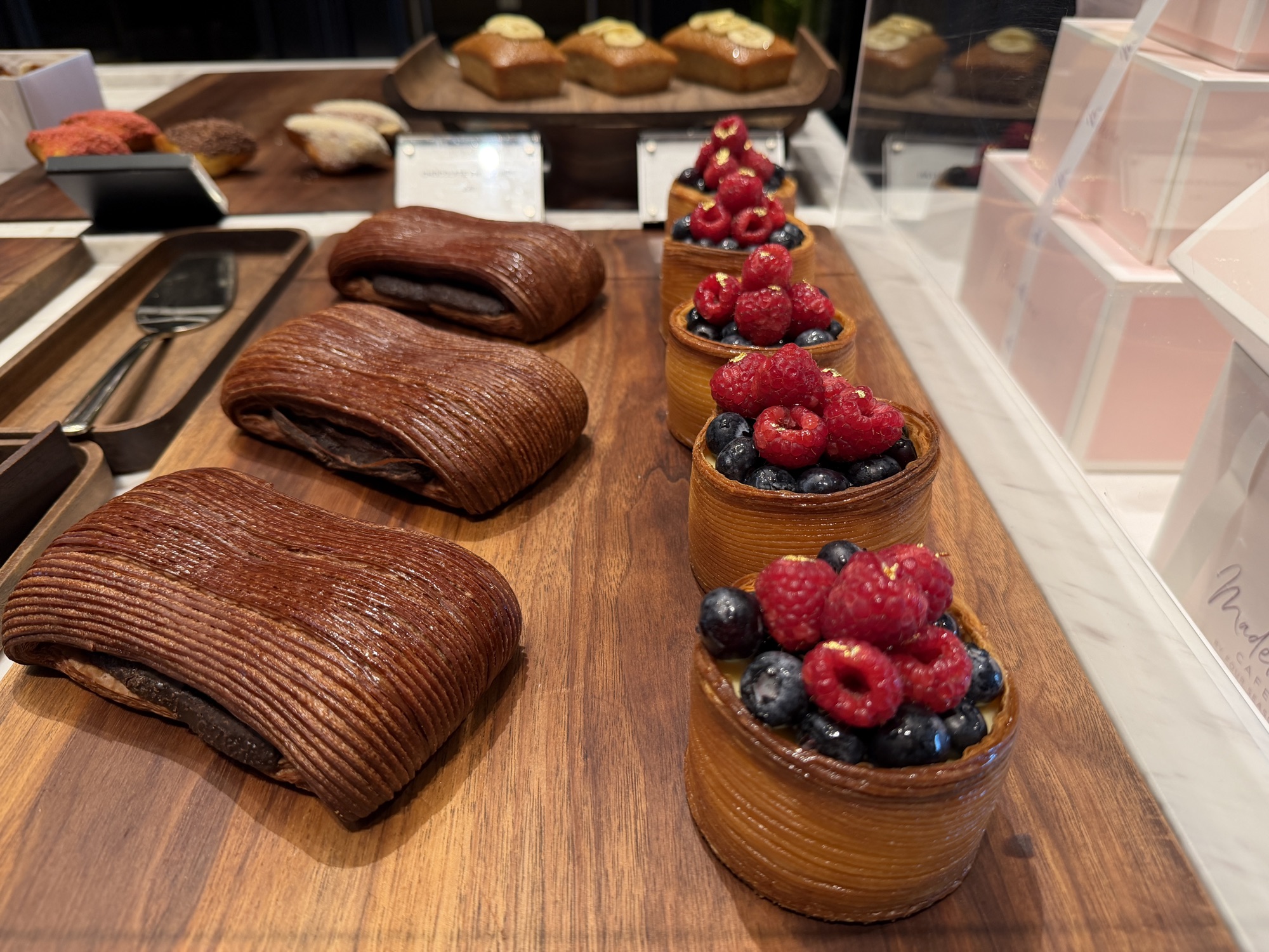 Chocolate rolls and berry tartlets at Café Madeleine at Four Seasons Hotel Bangkok at Chao Phraya River