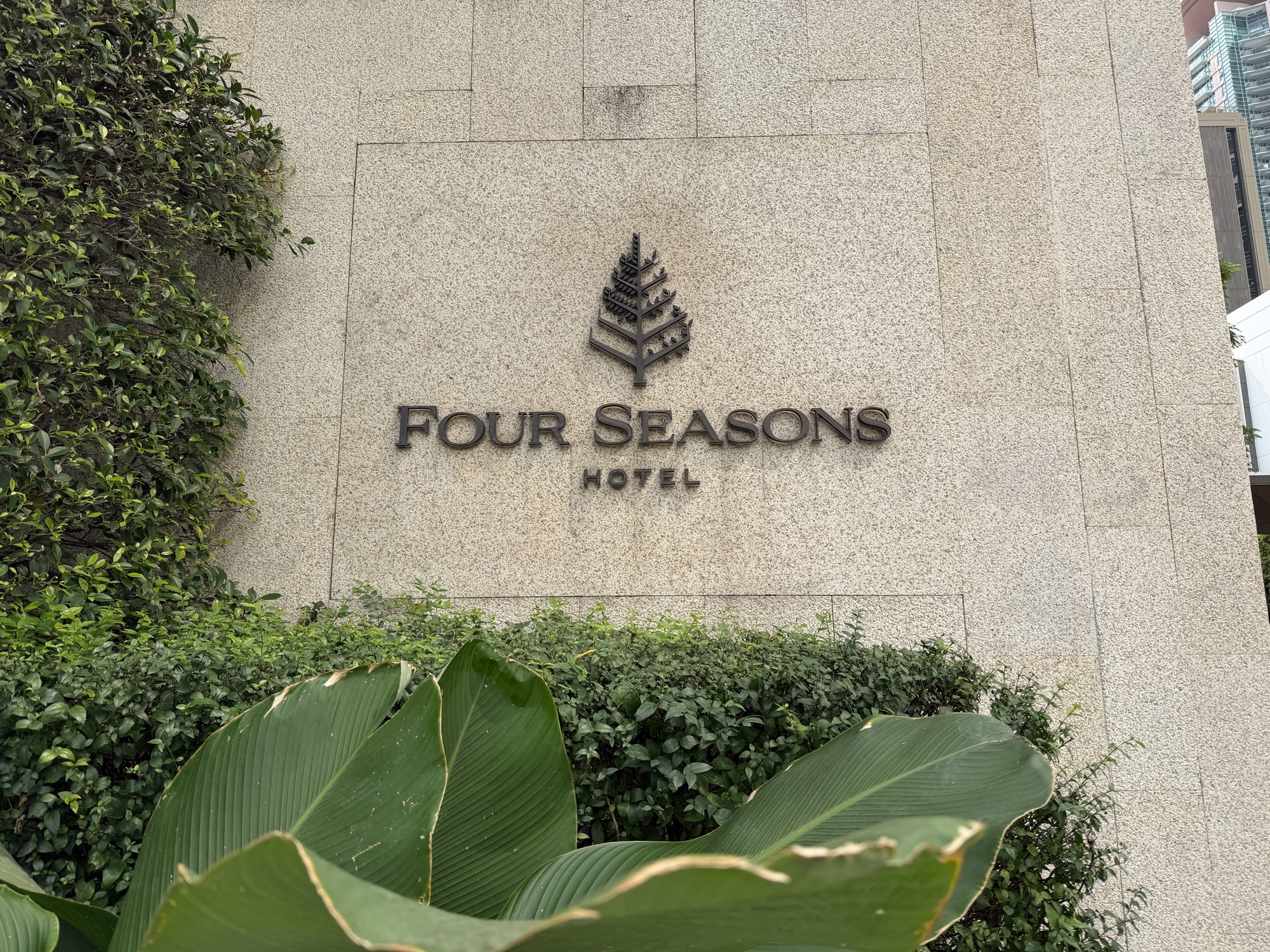 Four Seasons Hotel entrance sign at Four Seasons Hotel Bangkok at Chao Phraya River