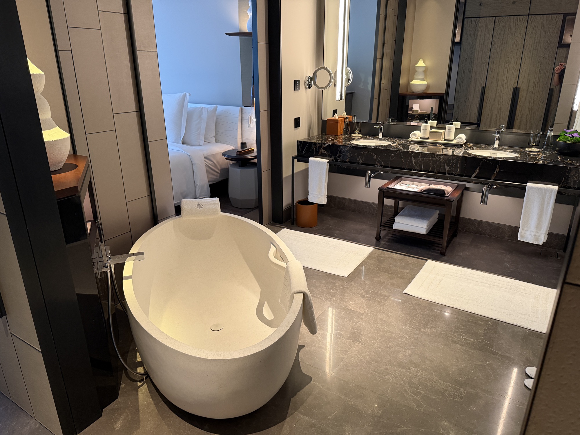 Riverfront Penthouse guest bedroom and bathroom at Four Seasons Hotel Bangkok at Chao Phraya River