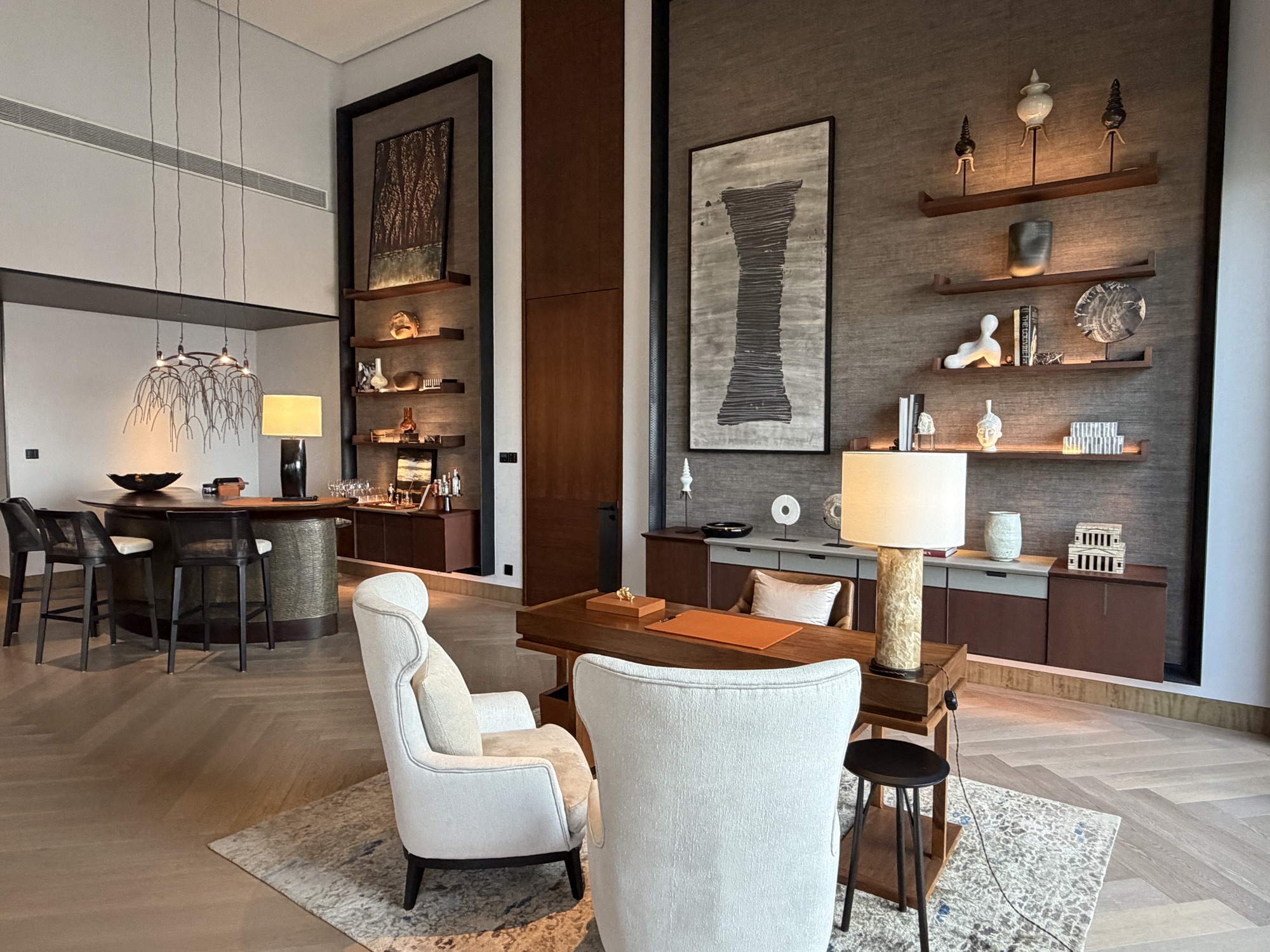 Second sitting area with bar beyond in the Riverfront Penthouse at Four Seasons Hotel Bangkok at Chao Phraya River