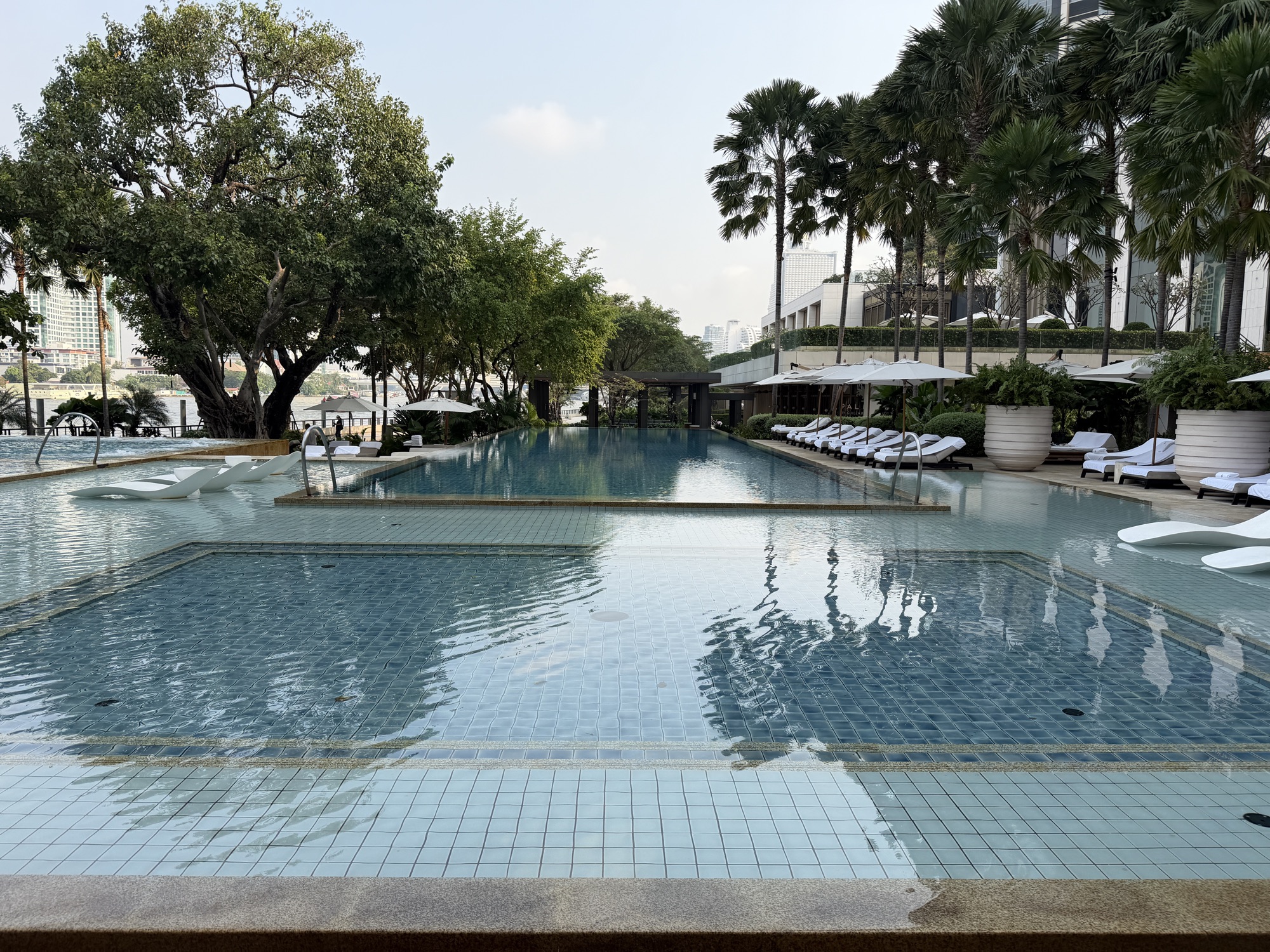 Upper tiers of the main pool at Four Seasons Hotel Bangkok at Chao Phraya River