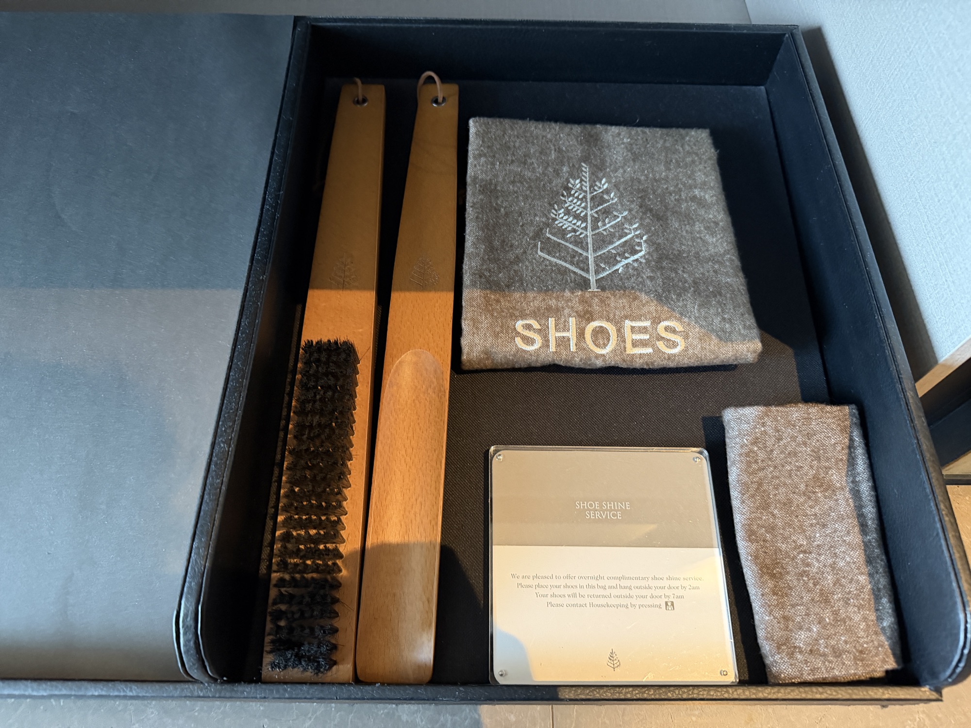 Shoe care kit in the Deluxe River-View Room at Four Seasons Hotel Bangkok at Chao Phraya River