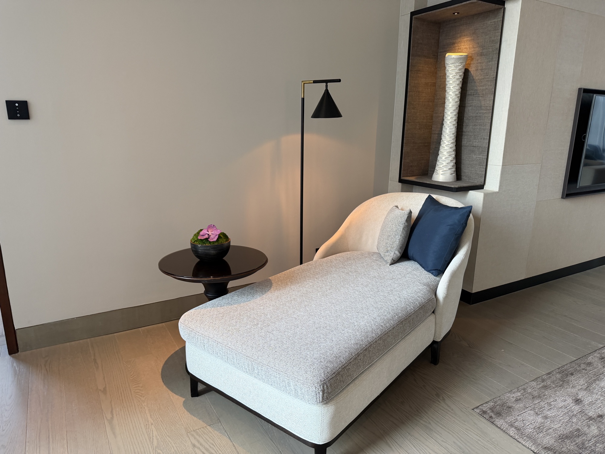 Chaise in the living area of the Executive Suite at Four Seasons Hotel Bangkok at Chao Phraya River