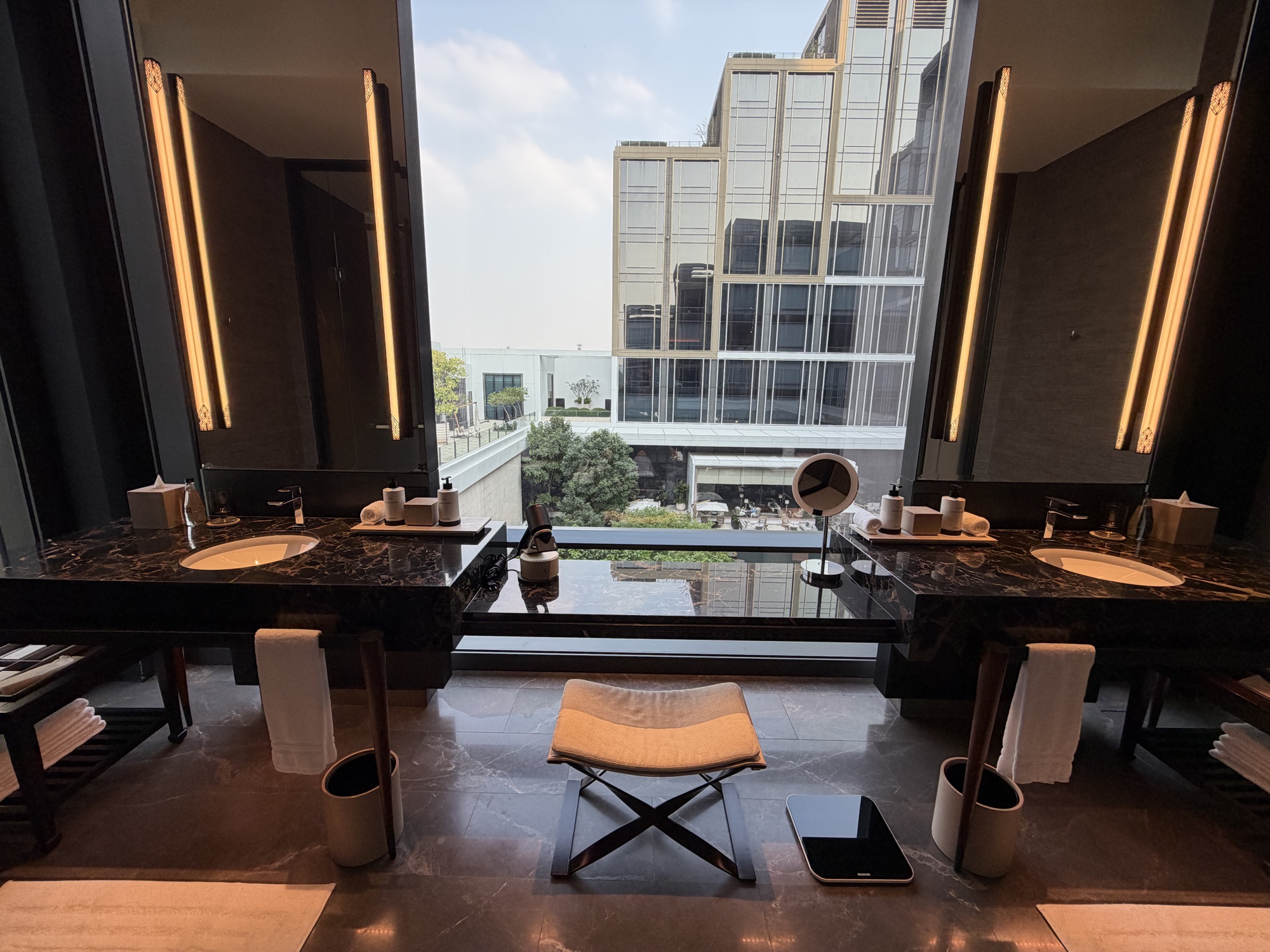 Double vanity with courtyard view in the Executive Suite at Four Seasons Hotel Bangkok at Chao Phraya River