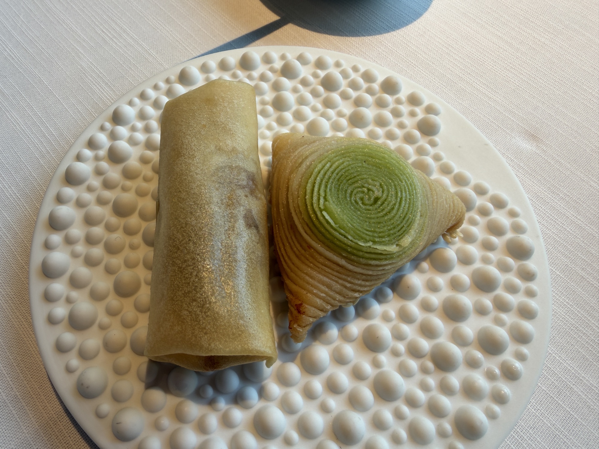 Deep-fried crab roe radish puff and mushroom spring roll at Yu Ting Yuan at Four Seasons Hotel Bangkok at Chao Phraya River
