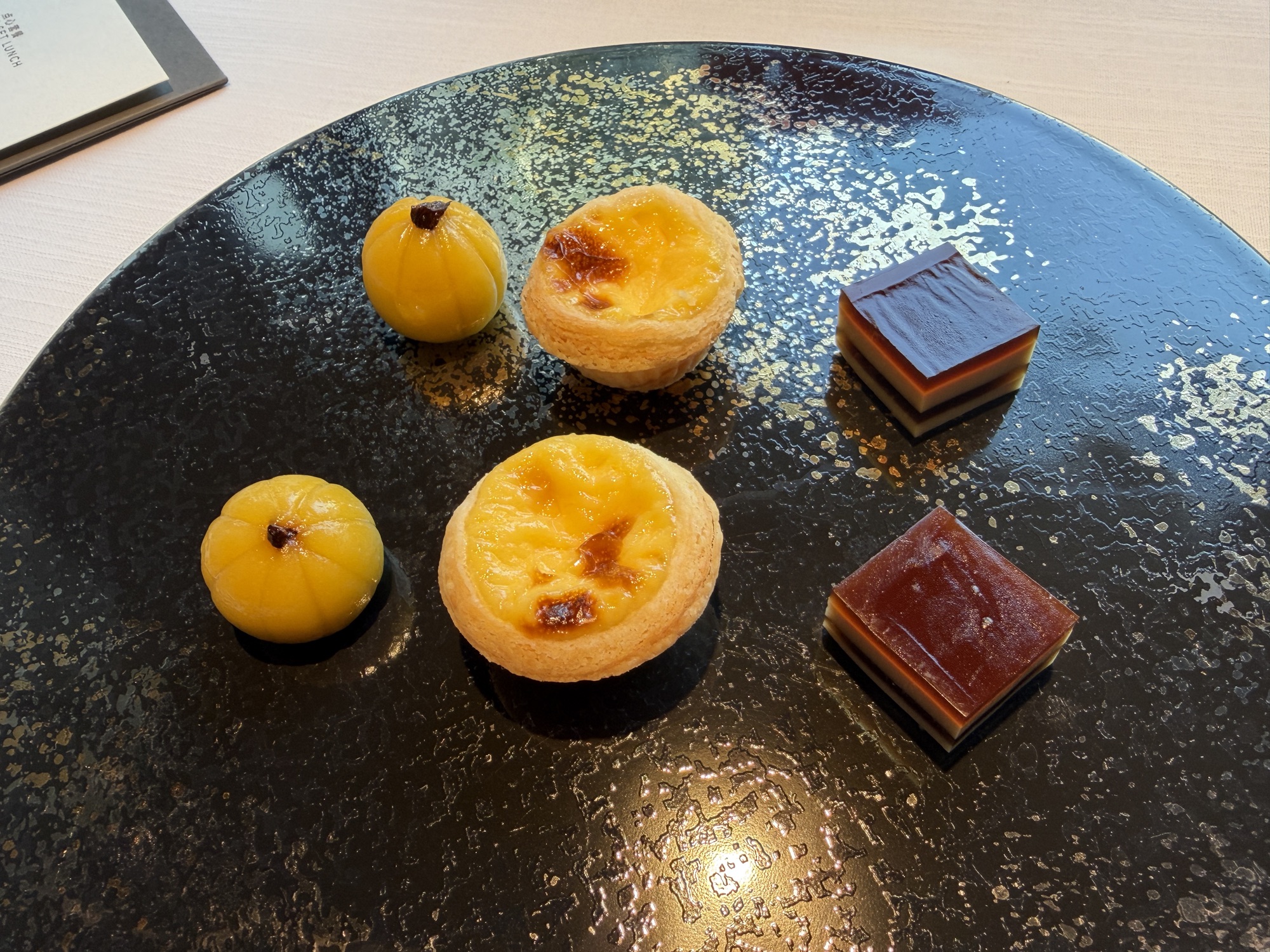 Petit fours with egg tarts at Yu Ting Yuan at Four Seasons Hotel Bangkok at Chao Phraya River