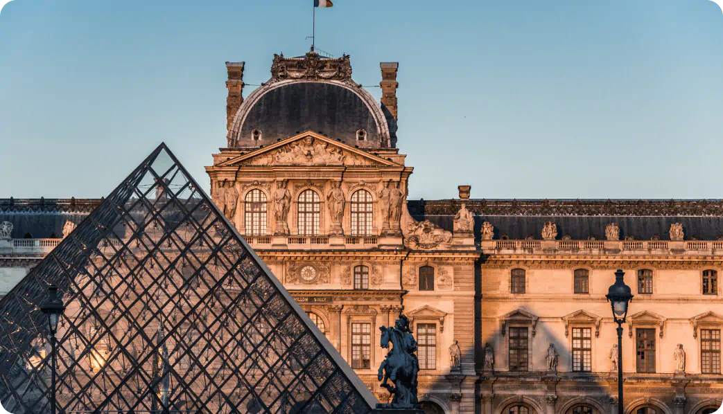 The glass pyramid and Pavillon Sully at the Musée du Louvre in Paris