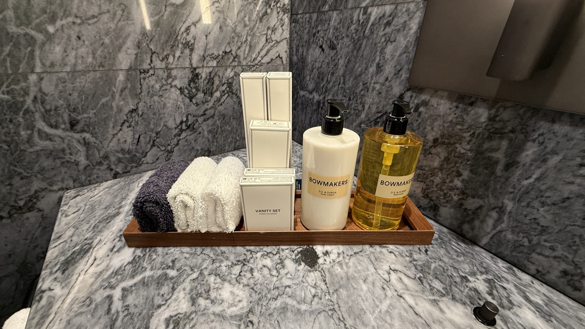 Corner Suite marble bathroom vanity with D.S. & Durga Bowmakers toiletries