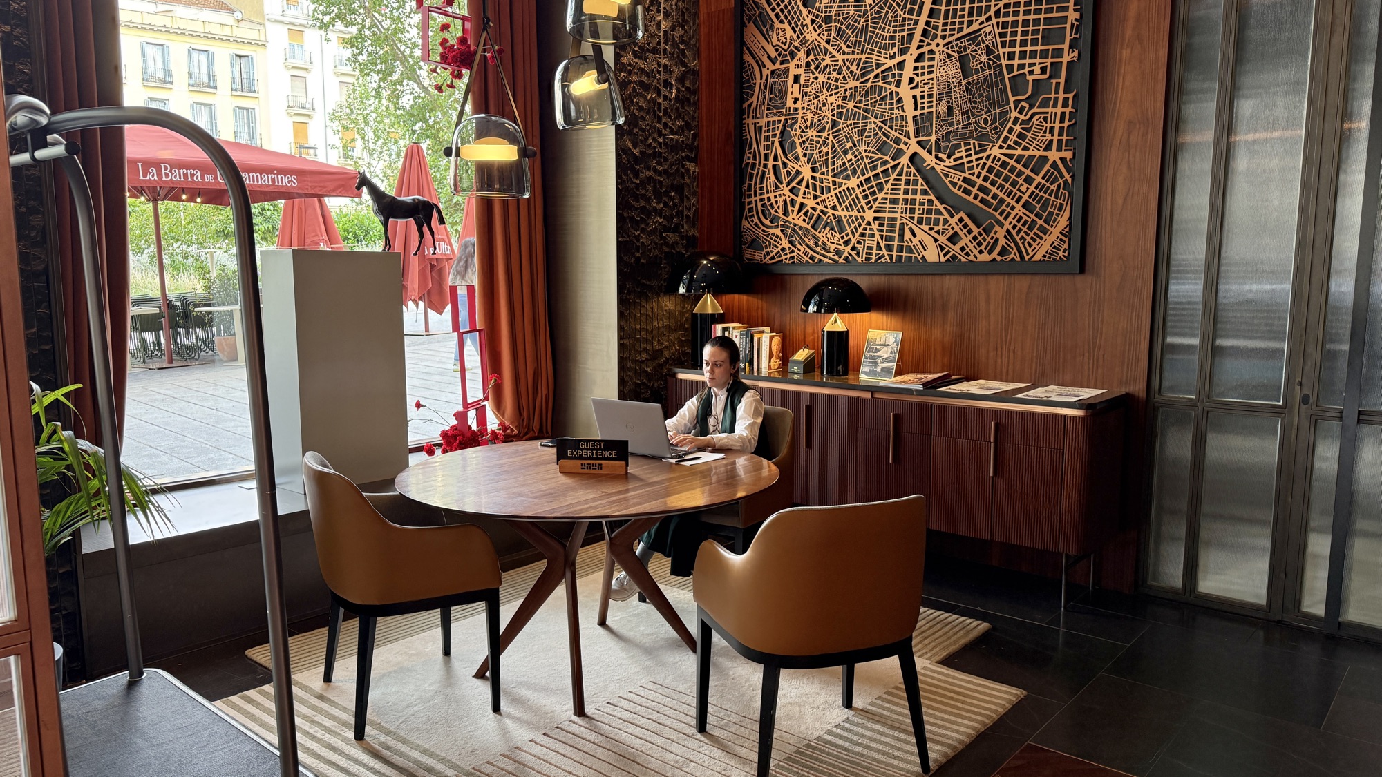 Lobby Bar seating nook beneath a Madrid street-map artwork