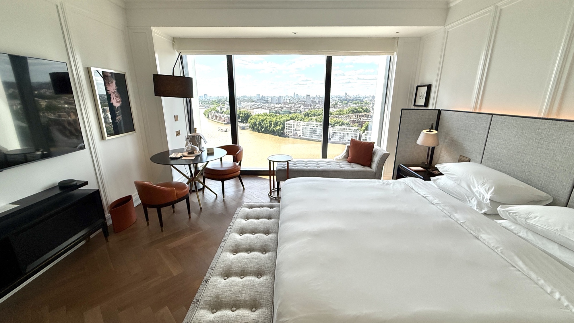 King Bed River View room at Park Hyatt London River Thames with the bed facing floor-to-ceiling windows over the River Thames