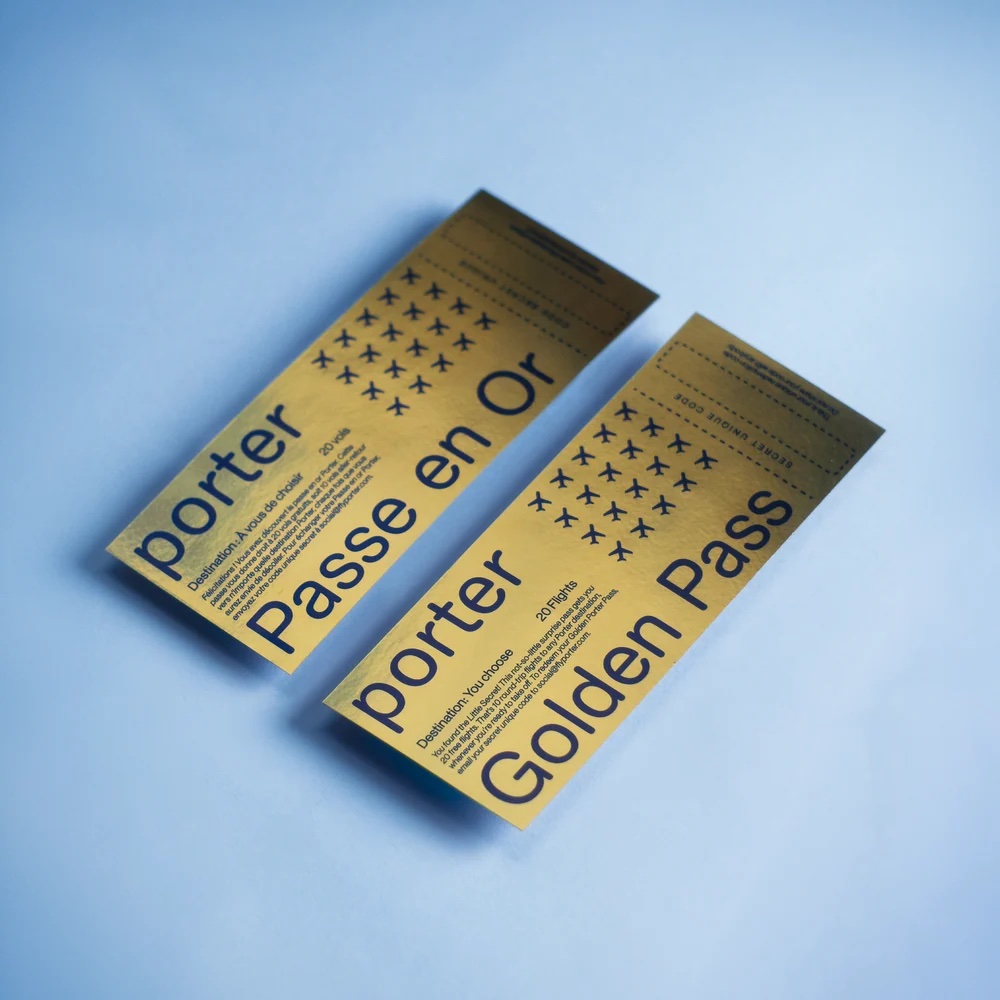 Two gold Porter Golden Pass certificates showing 20 flights and a secret unique code area