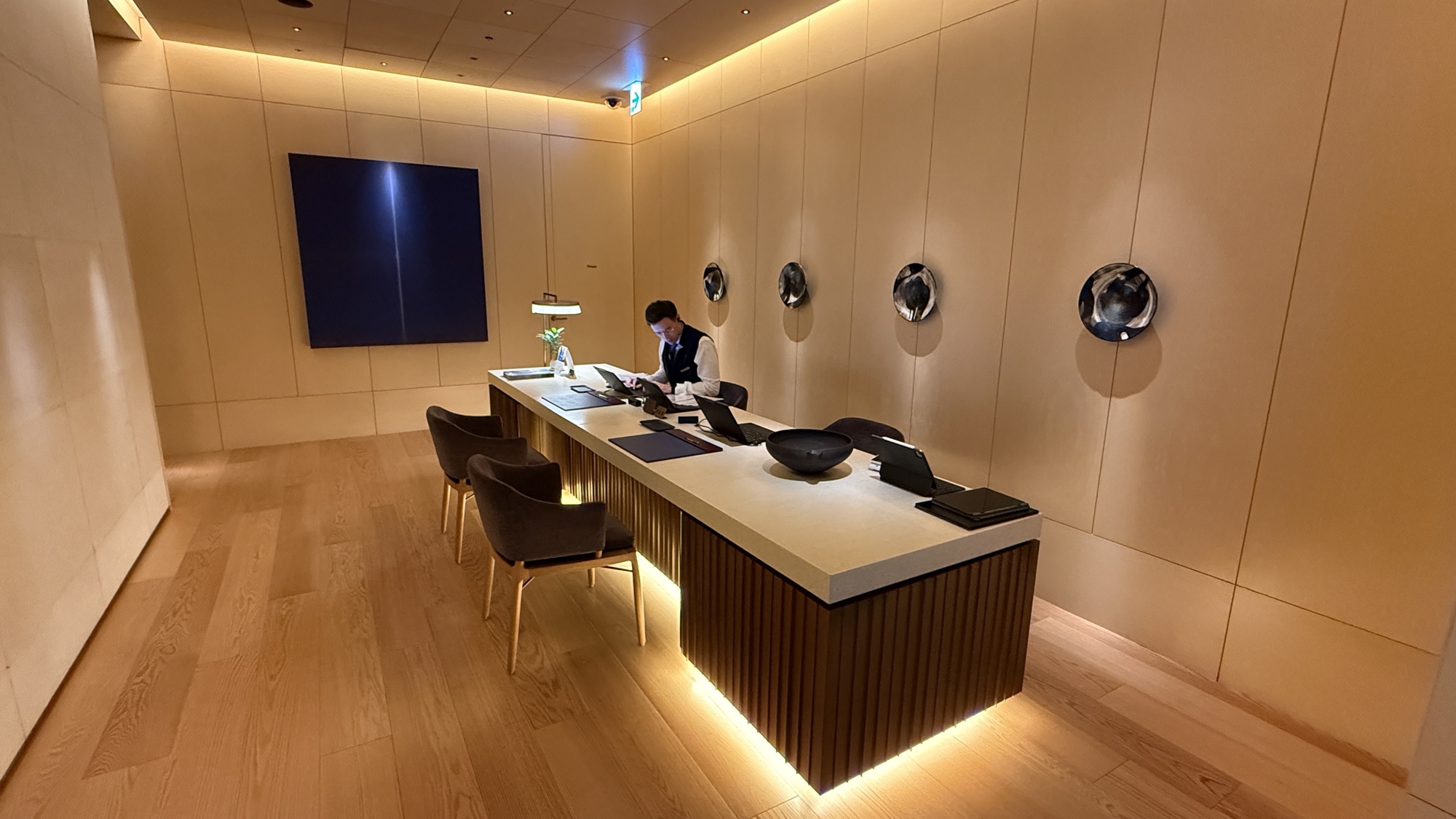 Check-in and concierge desk inside The Ritz-Carlton Club