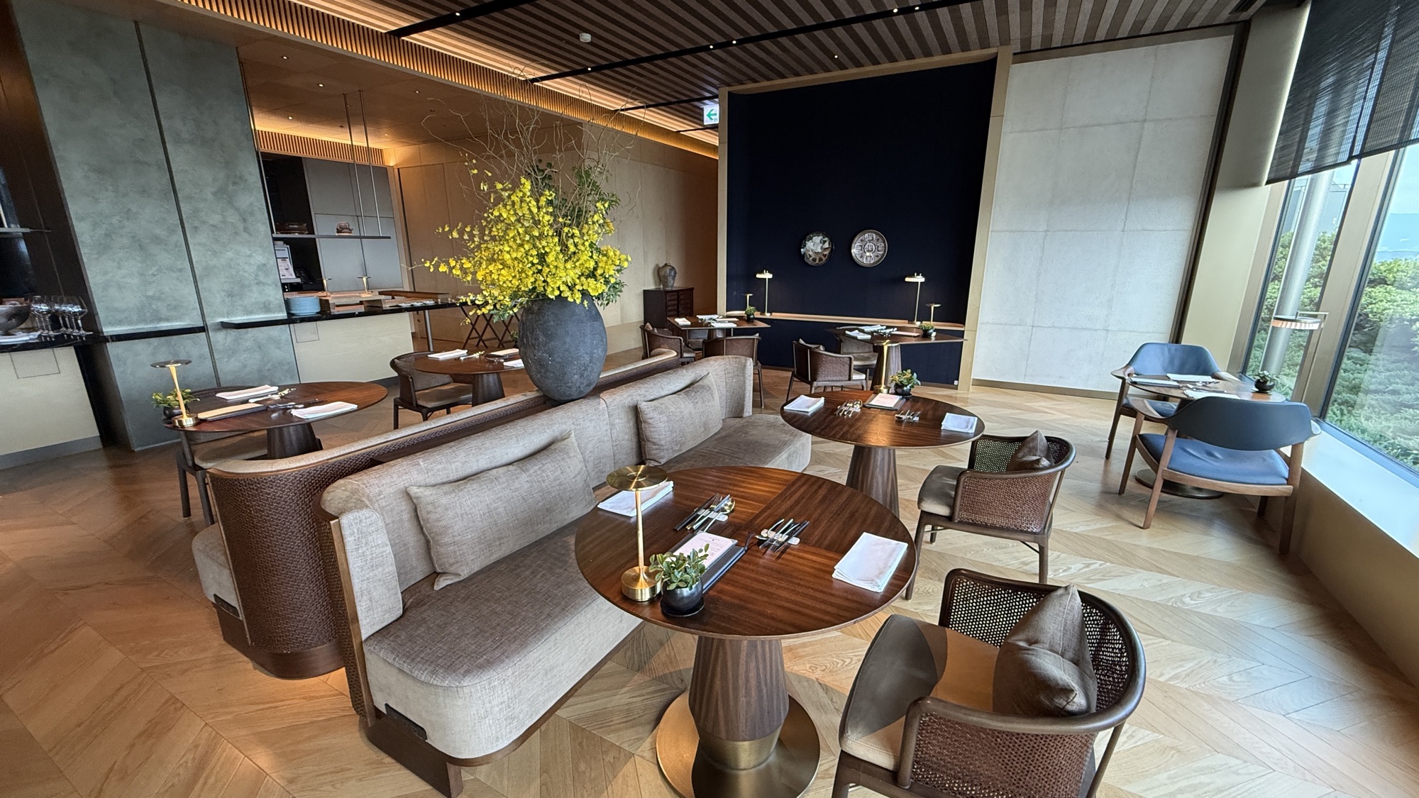 Banquette seating and tables in the Club Lounge
