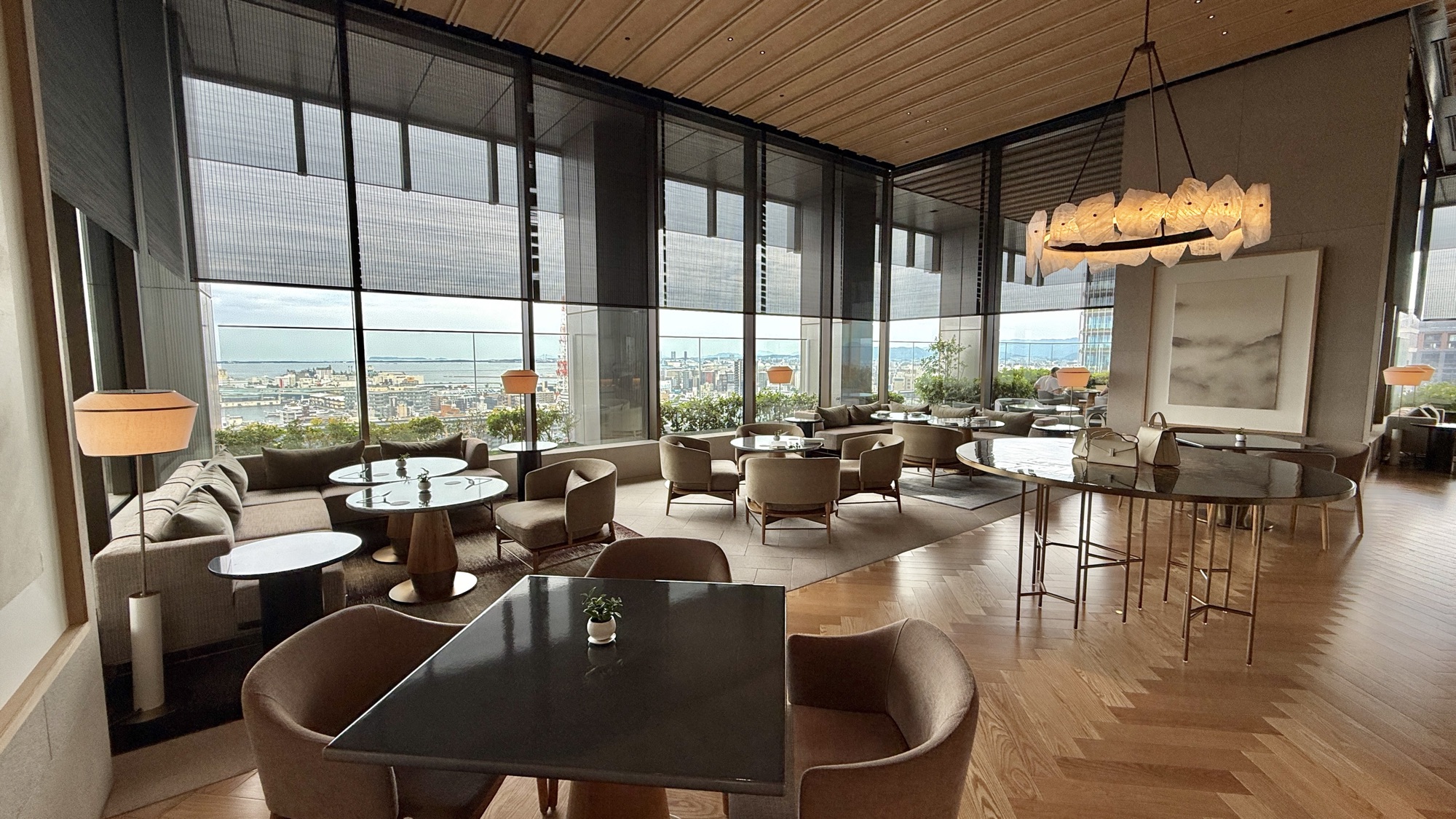 Seating area at Café Diva with floor to ceiling windows