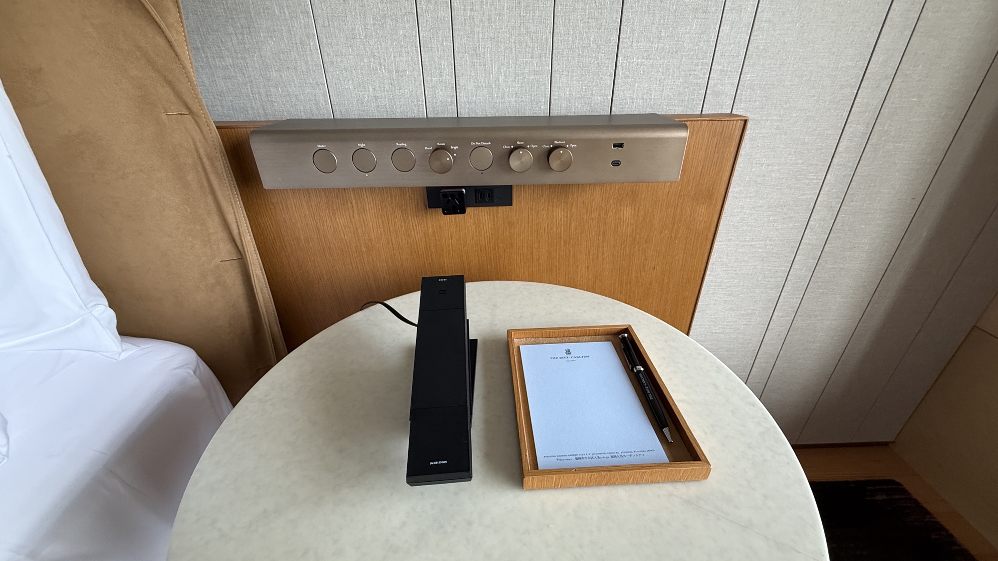 Bedside control panel and tray with tablet and phone