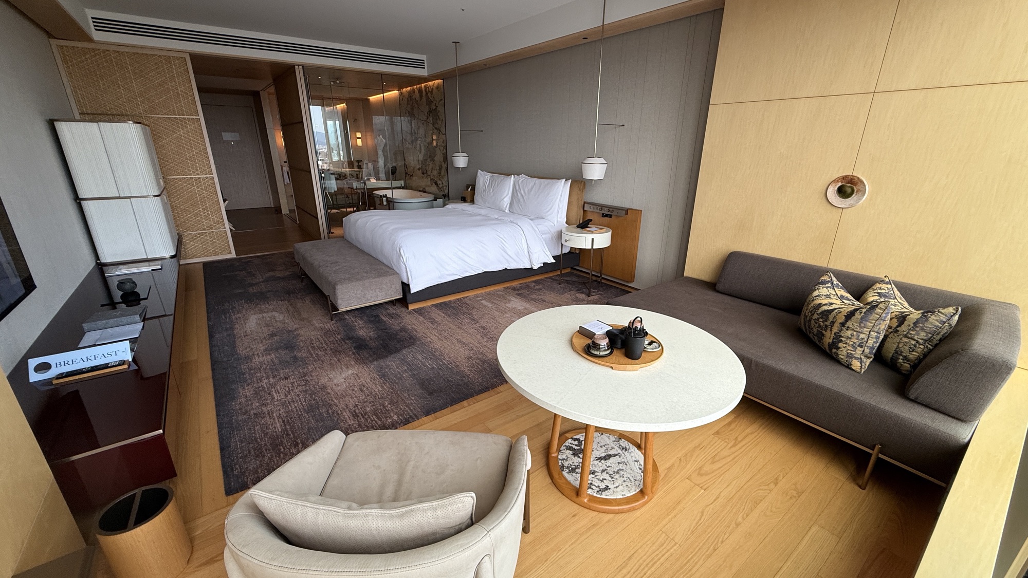 Guest room looking from the seating area toward the bed