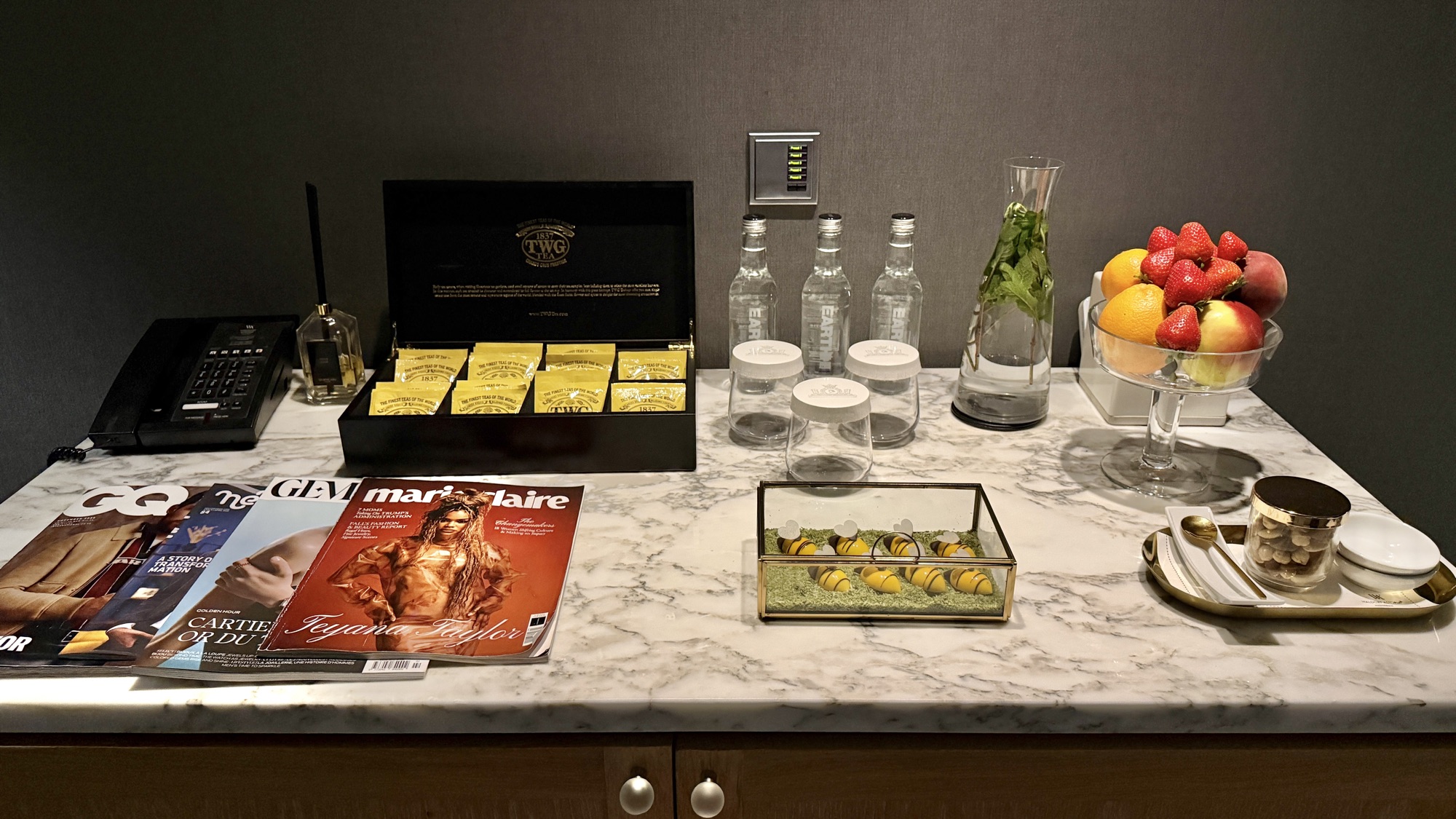 Tea, snacks, and magazines laid out in the spa relaxation room