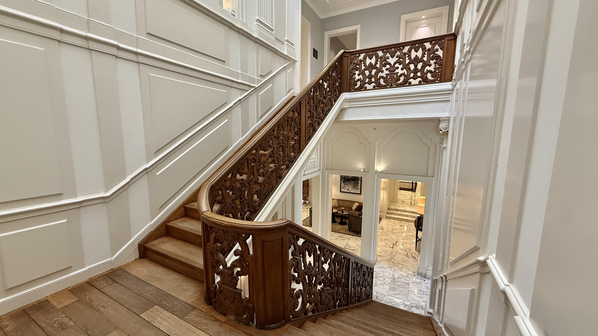 The original carved wooden staircase from Mayor Hendrik Hooft's residential palace, now the main hotel building