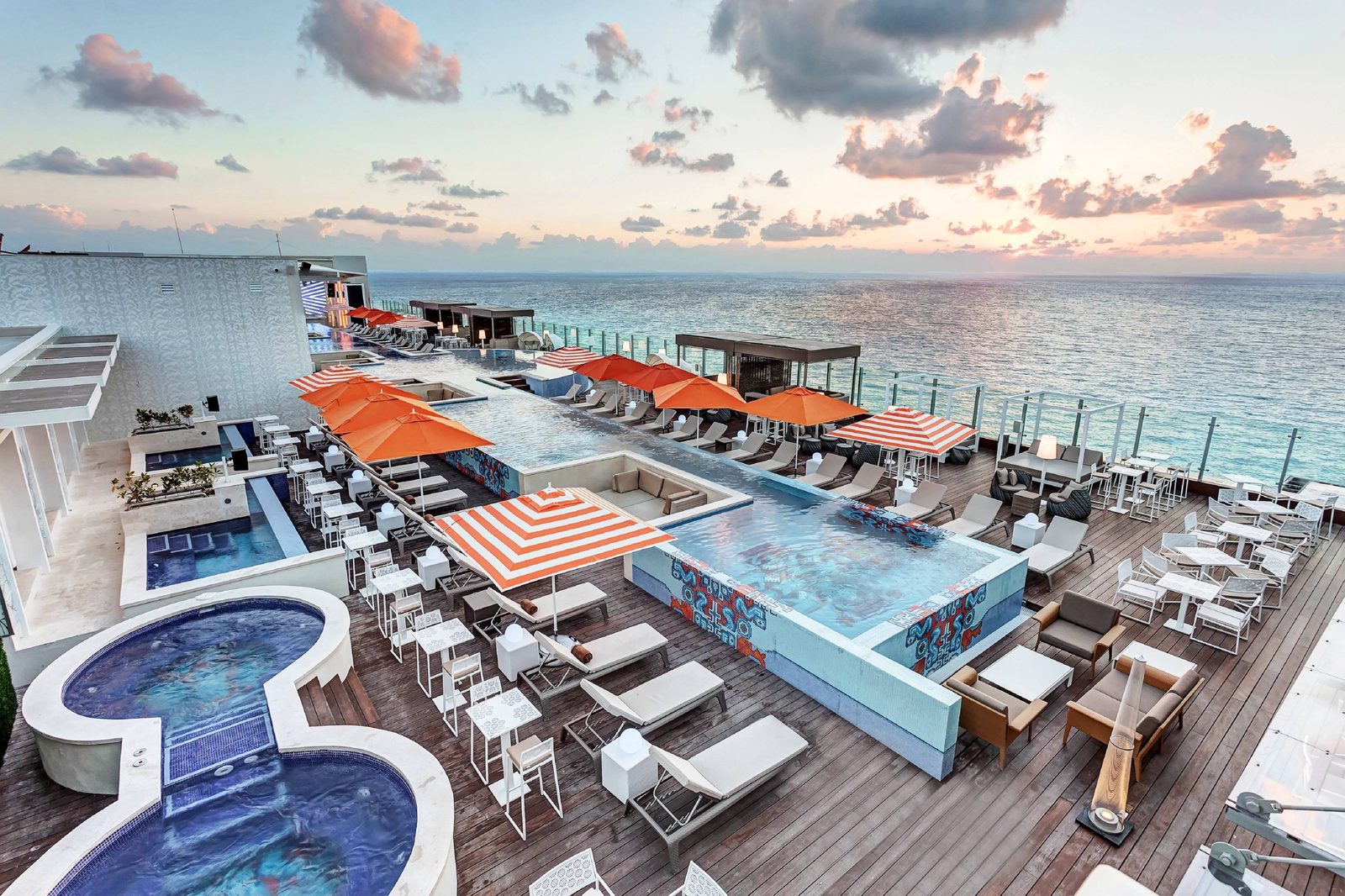 Rooftop pool deck at Royalton CHIC Cancun, an Autograph Collection All-Inclusive Resort